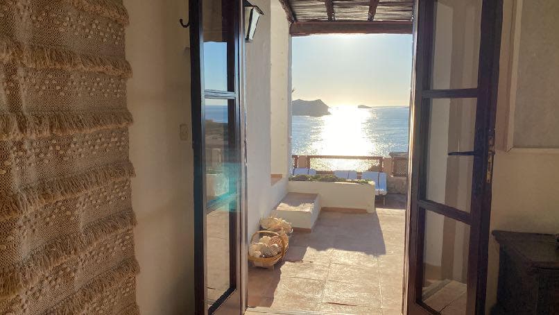 Stone archway framing the interior rooms at Villa Incienso, Sant Josep, Ibiza