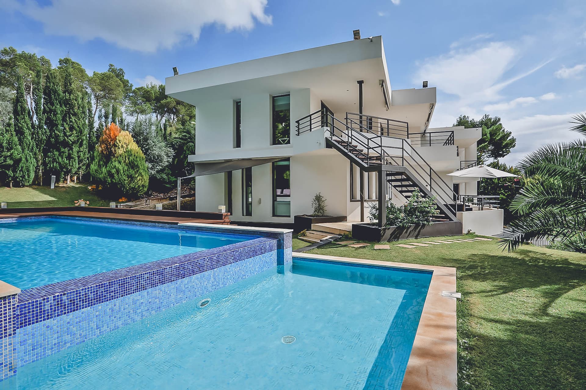 Swimming pool and sculptural external stair at Can Retama, Jesus, Ibiza