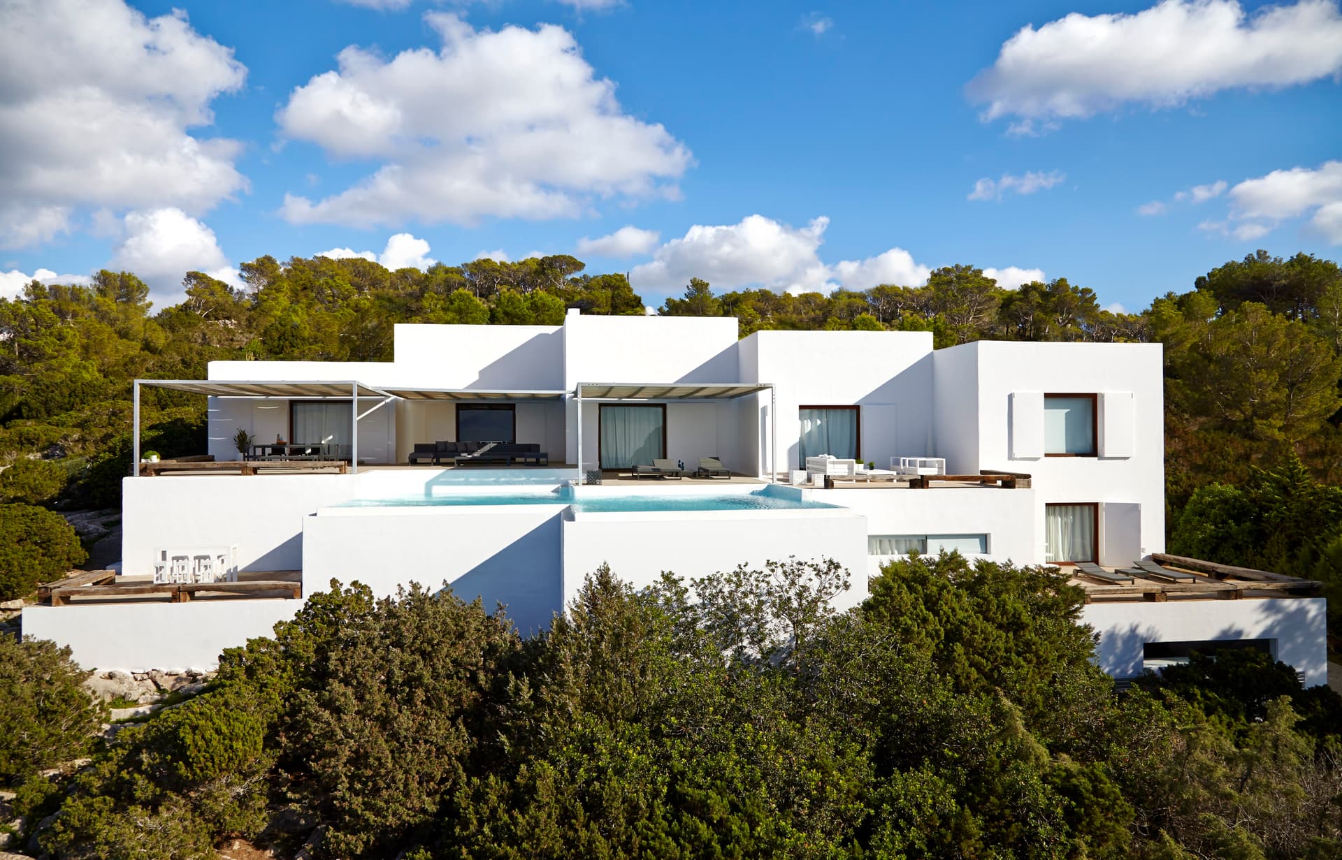 Contemporary white volumes set among the pines at Villa Na Xamena, Sant Joan de Labritja, Ibiza