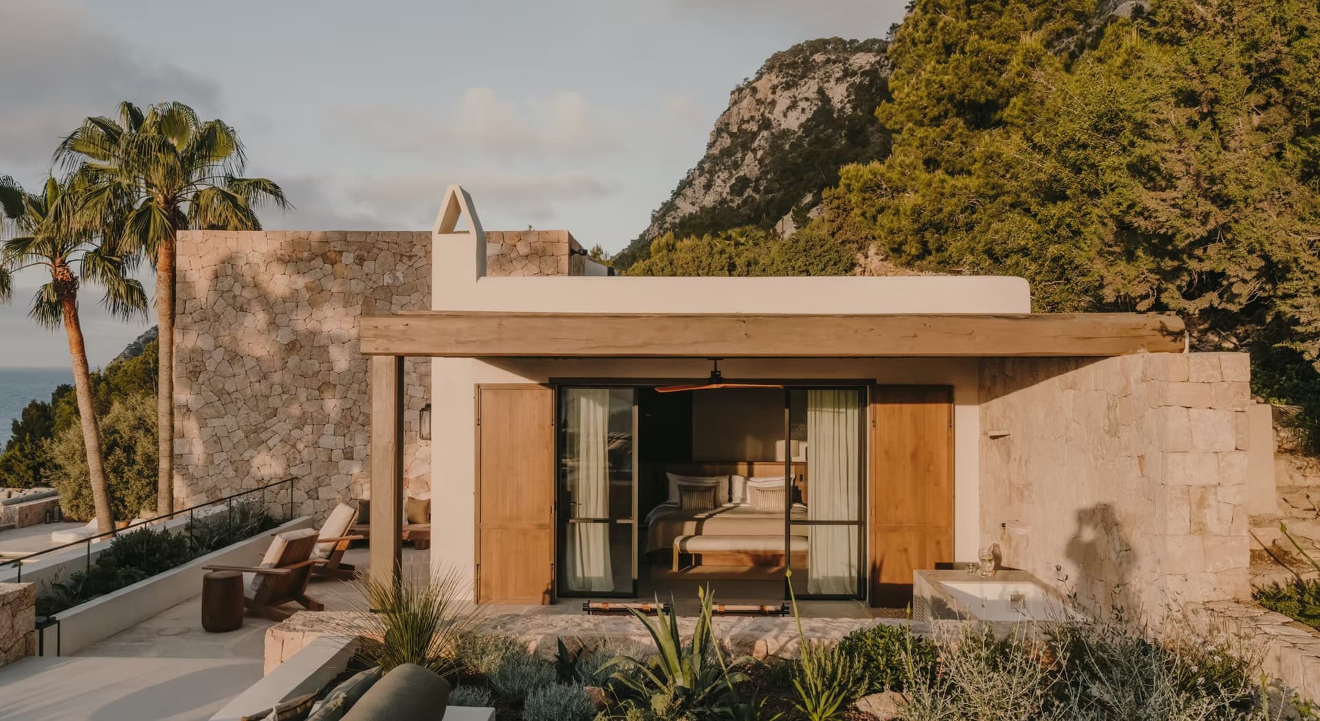 Entrance in stone and timber at Villa Infinie, Es Cubells, Ibiza