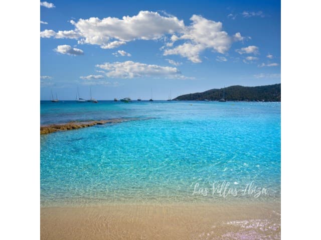 Clear turquoise water and beach below the property, Ses Salines natural park, Sant Jordi, Ibiza