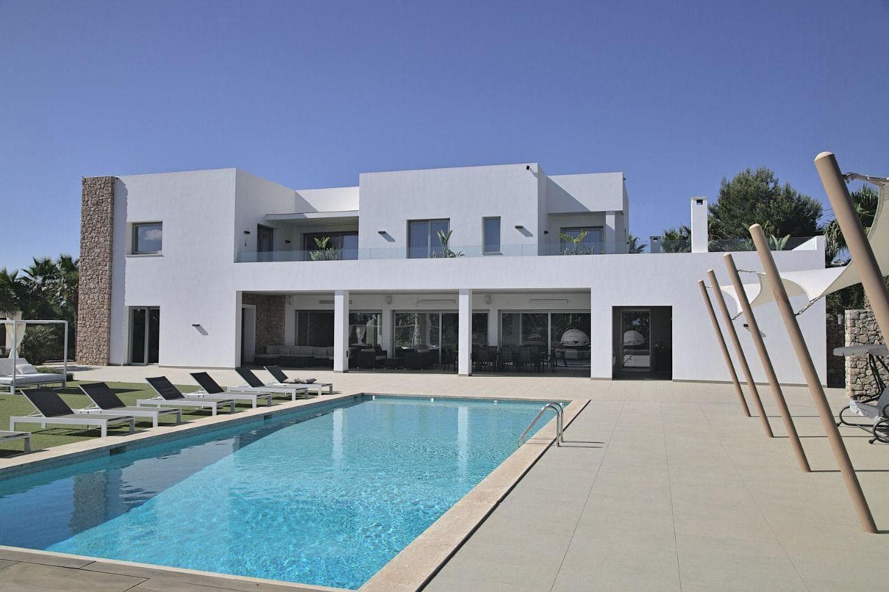 Casa Fourteen seen from the garden, a white contemporary villa in Jesus, Ibiza