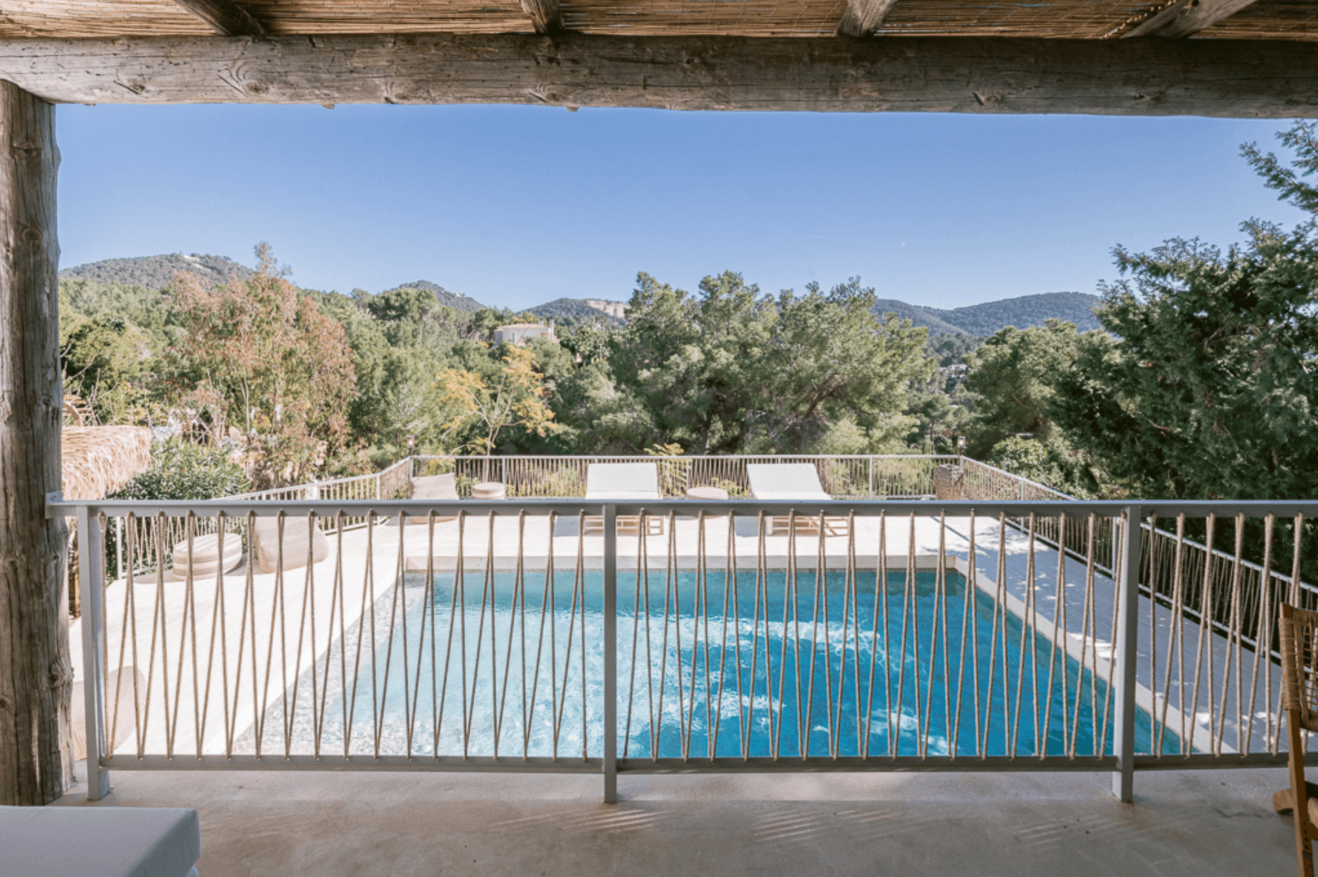 Swimming pool looking out across the countryside at a villa in Can Furnet, Jesus, Ibiza