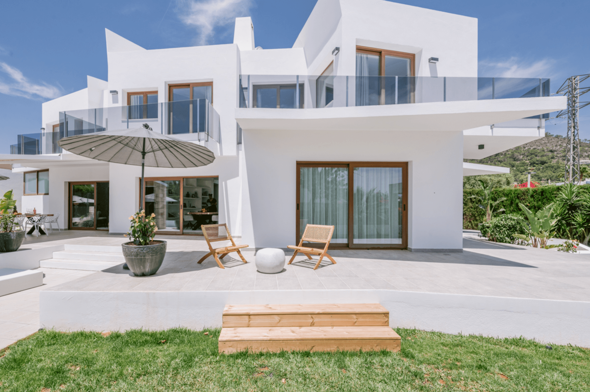 Contemporary white villa with stepped terraces above the lawn, Sa Carroca, Ibiza