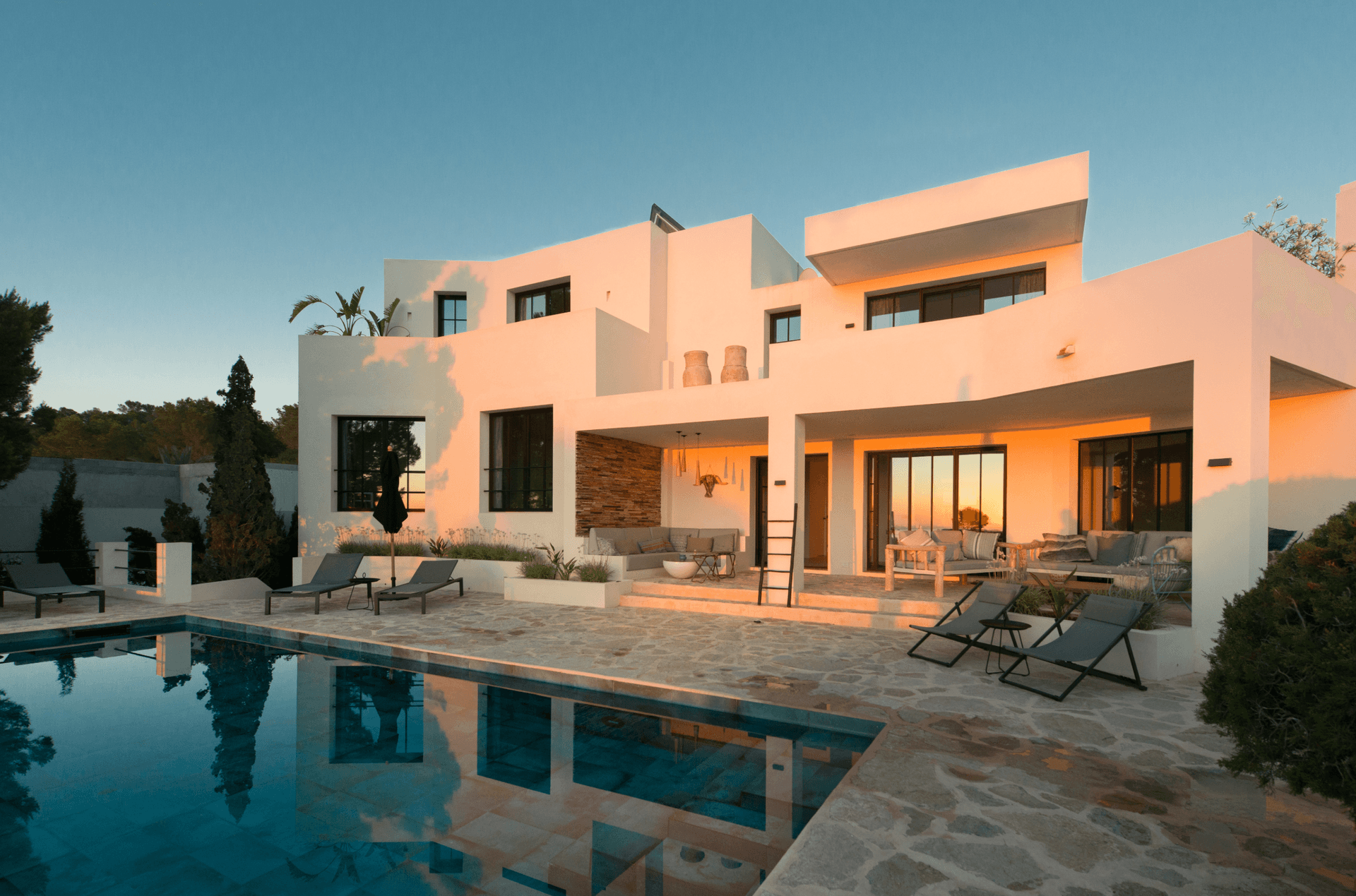 Rendered villa in warm ochre with a swimming pool and terraces, Sant Josep, Ibiza
