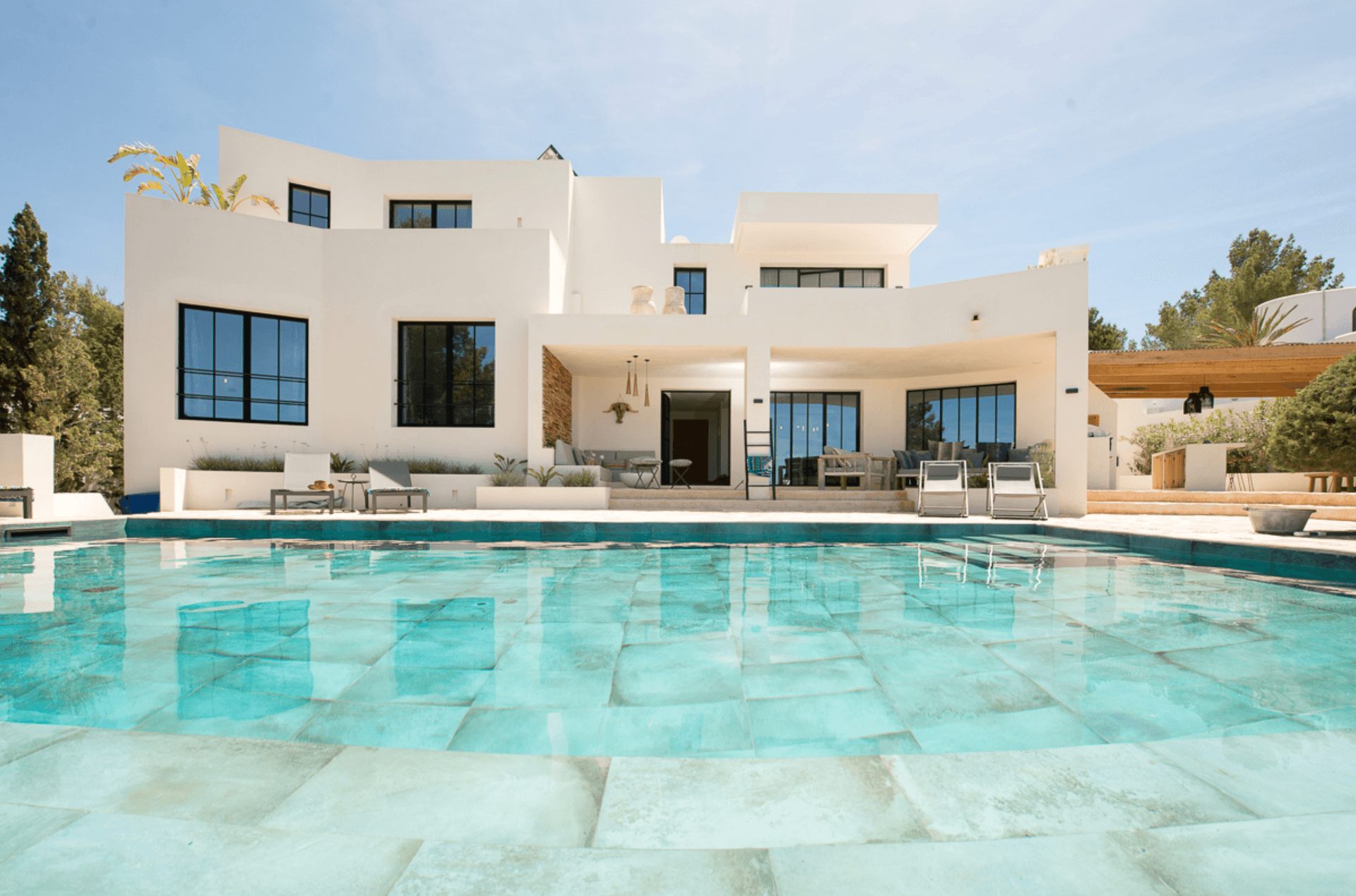 Swimming pool running along the terrace of a villa with immersive sea views, Sant Josep, Ibiza