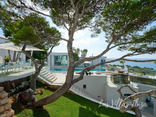 Villa Sun set among pines on the slope above the sea, Cala Moli, Ibiza